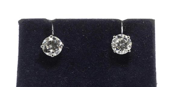 Appraisal: DIAMOND EAR STUDS White gold Elegant solitaire model ear studs