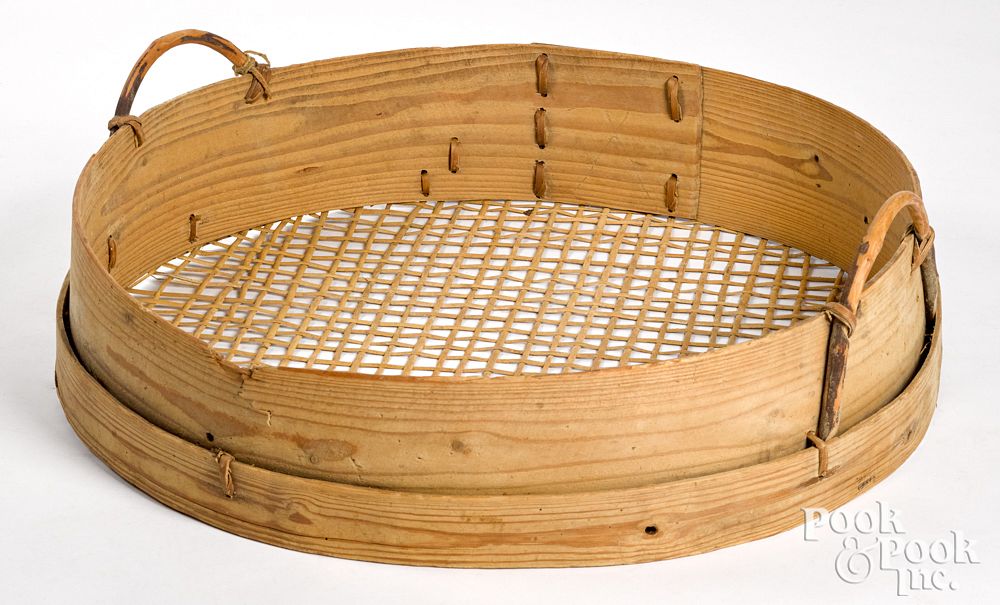 Appraisal: Large Scandinavian sieve basket th c Large Scandinavian sieve basket