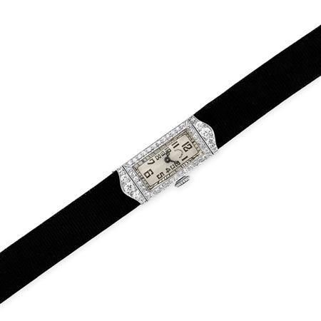 Appraisal: Platinum and Diamond Wristwatch with Grosgrain Ribbon Strap Tiffany Co