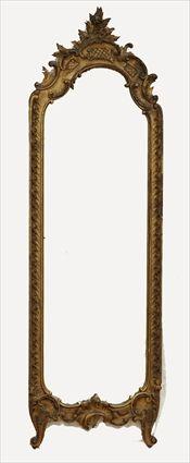 Appraisal: Rococo-Style Carved Giltwood Pier Mirror x in