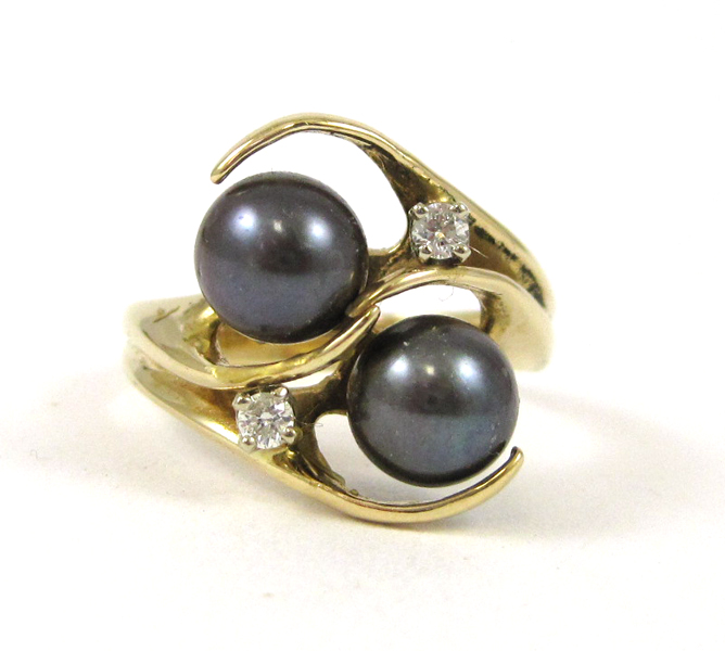 Appraisal: BLACK PEARL AND DIAMOND RING k yellow gold set with