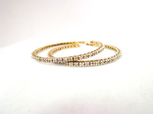 Appraisal: Pair of K yellow gold diamond hoop pierced earrings with