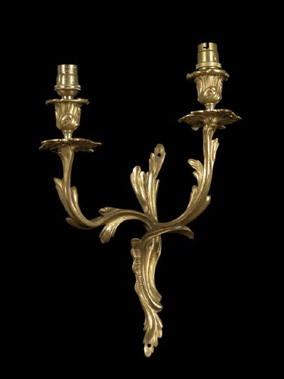 Appraisal: French Rose-Gilt Brass Two-Light Applique in the Regence style electrified