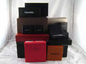 Appraisal: A quantity of presentation boxes including Yves Saint Laurent Chanel