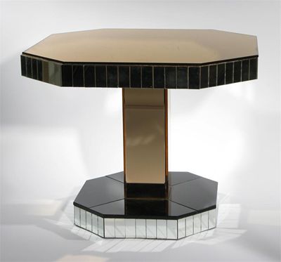 Appraisal: A peach tinted mirrored glass side table square section on