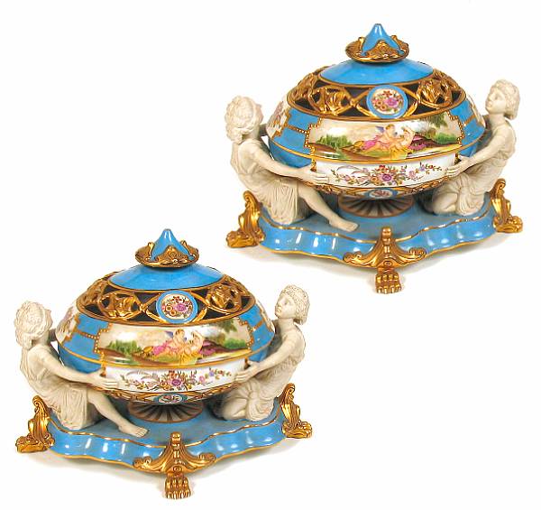 Appraisal: A pair of bisque porcelain covered tureens height in width