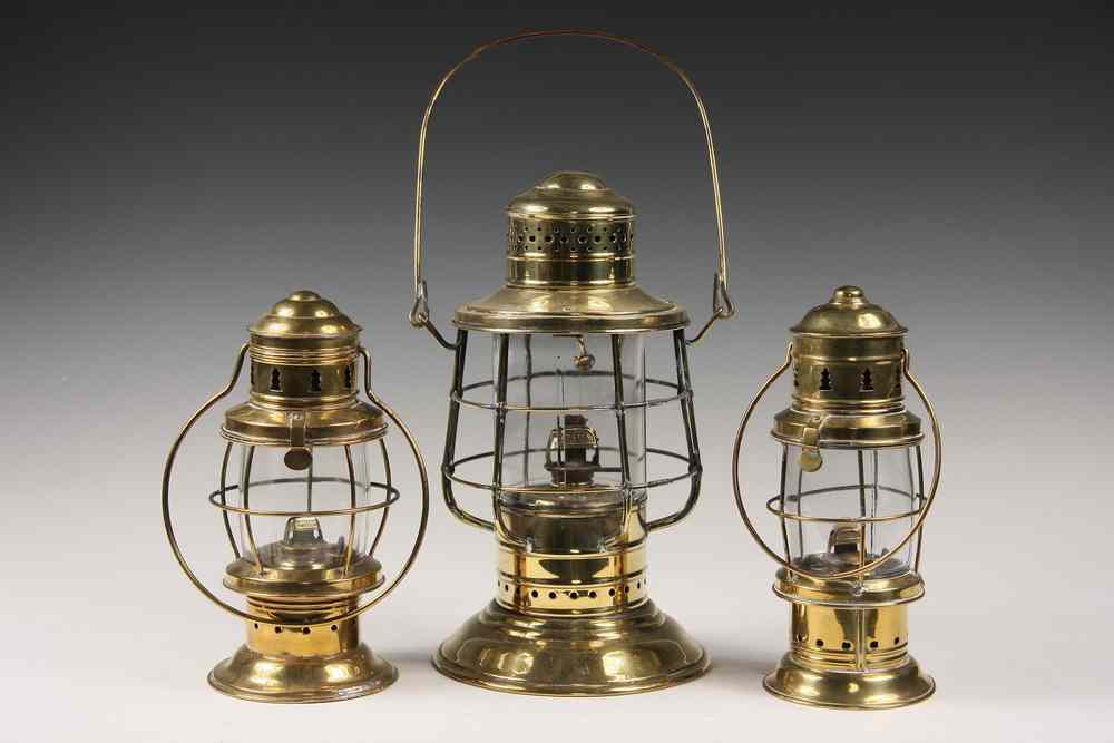 Appraisal: BRASS YARDARM LANTERNS - Three Brass Ships Yardarm Lanterns including