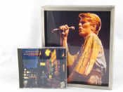 Appraisal: A box framed signed photo of David Bowie and a