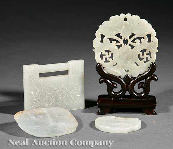 Appraisal: A Group of Four Antique Chinese Archaistic Carved Jade Pendants