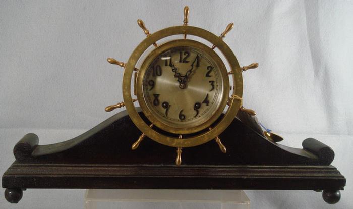 Appraisal: Brass ships wheel clock dial unsigned winds runs chimes mahogany