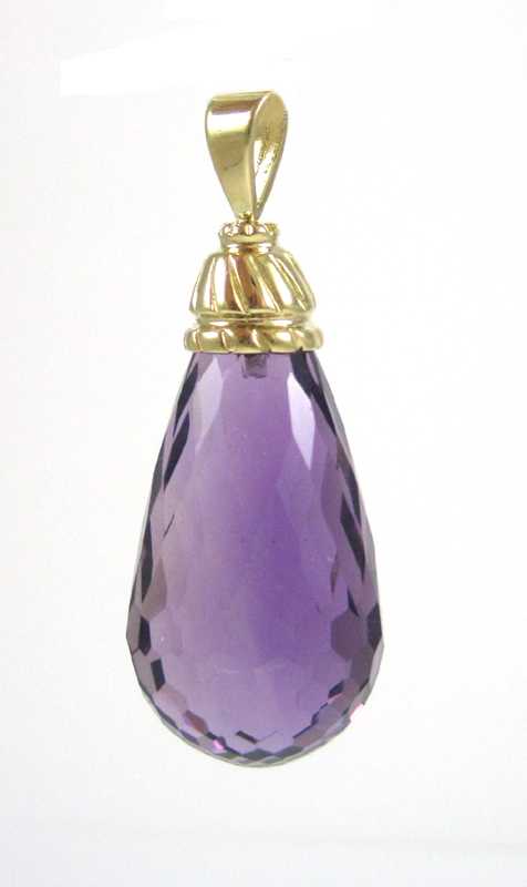 Appraisal: AMETHYST AND FOURTEEN KARAT GOLD PENDANT with a large briolette