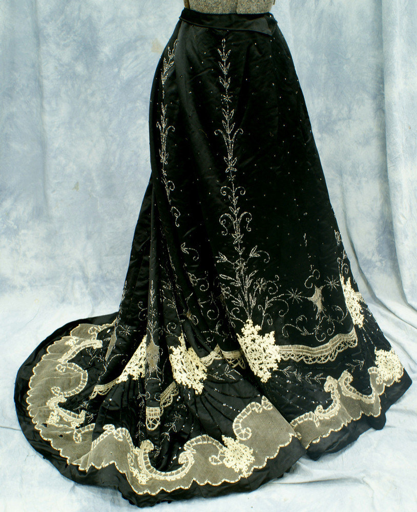 Appraisal: Black satin heavily beaded Victorian skirt with lace net and