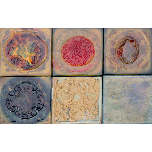 Appraisal: TIFFANY STUDIOS Six glass tiles four with assorted medallions on