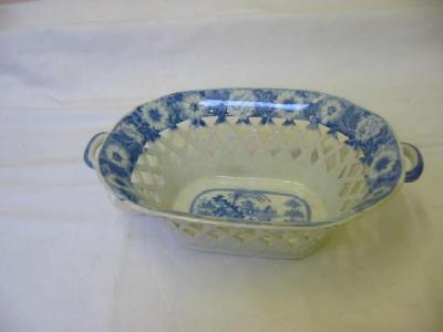 Appraisal: A BLUE AND WHITE CHESTNUT BASKET of oval form with