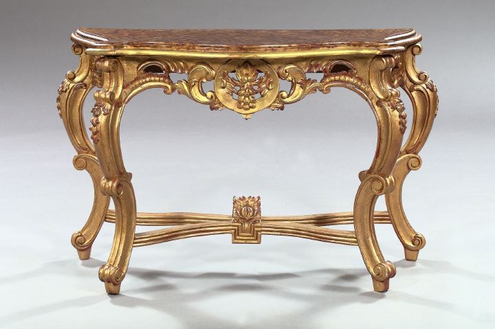 Appraisal: Louis XV-Style Faux-Marbre and Gilt-Painted Table with a serpentine pierced