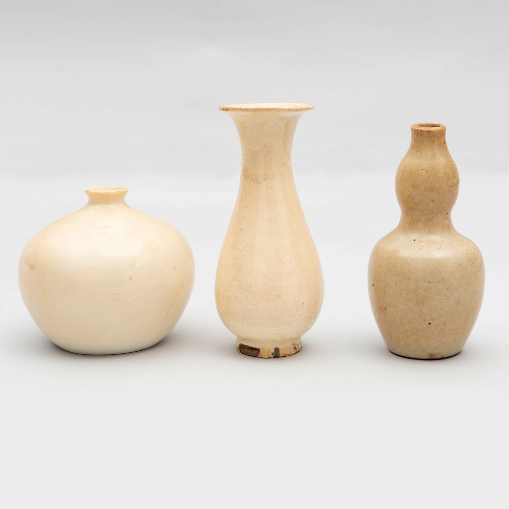 Appraisal: Three Chinese White Glazed Porcelain Vessels Comprising A double gourd