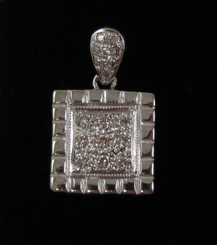 Appraisal: DIAMOND AND EIGHTEEN KARAT WHITE GOLD PENDANT a square tablet