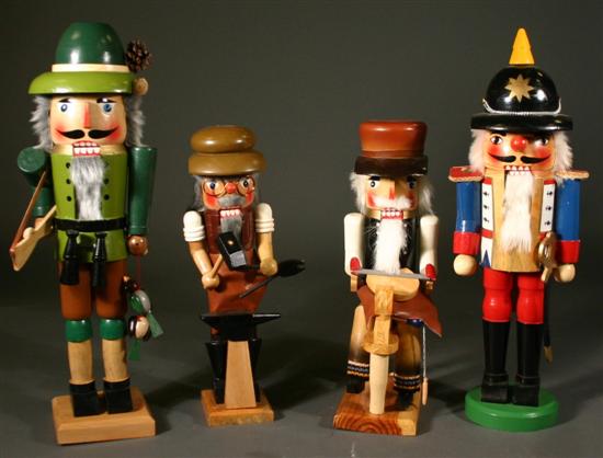 Appraisal: Group of four modern nutcrackers Including a hunter a officer