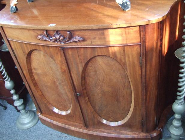 Appraisal: A Victorian mahogany chiffonier the shaped top over a pair