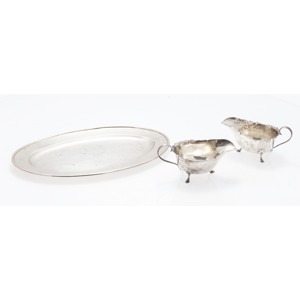 Appraisal: ALTERATION TO LEAD ITEM An oval serving dish Goldsmiths Silversmiths