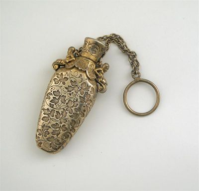 Appraisal: A th century French silvergilt scent with a finger chain