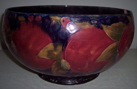 Appraisal: A Moorcroft pottery bowl painted pomegranates to the exterior cm