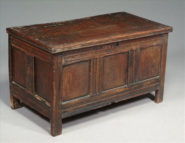 Appraisal: An oak coffer early th century the rectangular hinged top