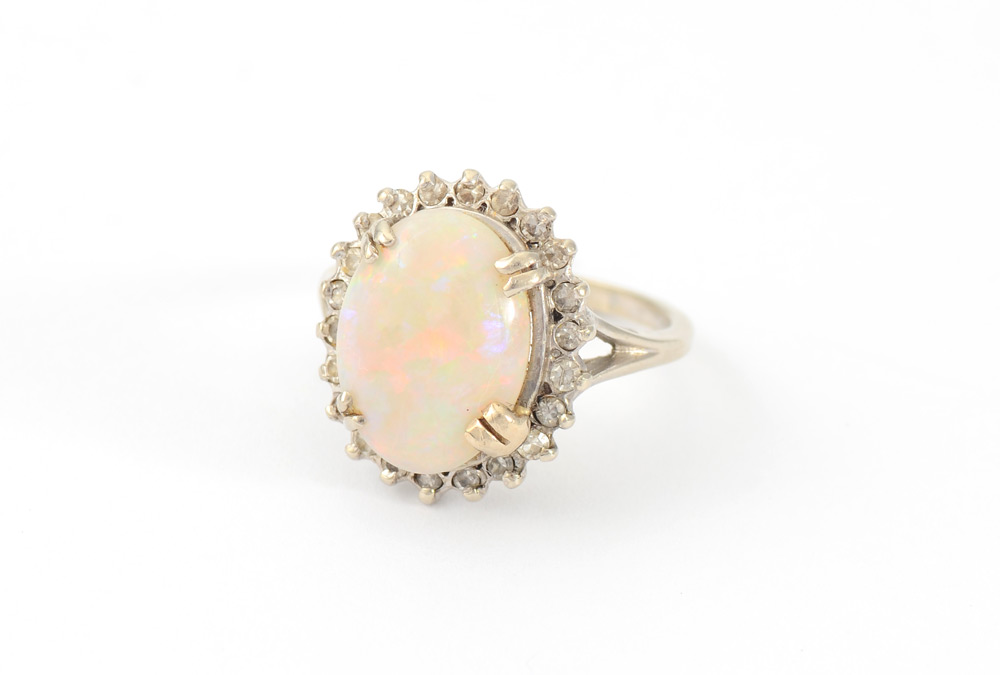 Appraisal: OPAL DIAMOND RING K white gold ring centering one cabochon