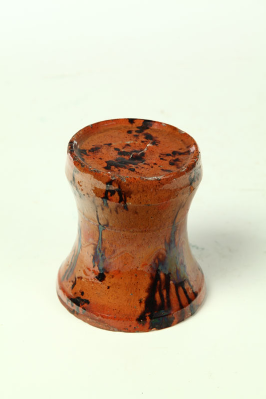 Appraisal: REDWARE LAMP TIDY American mid th century Flared base tooled