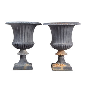 Appraisal: A Pair of Cast Iron Garden Urns Height x diameter