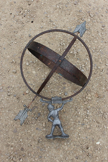 Appraisal: AN OLD IRON ARMILLARY SPHERE SUNDIAL supported by a cast