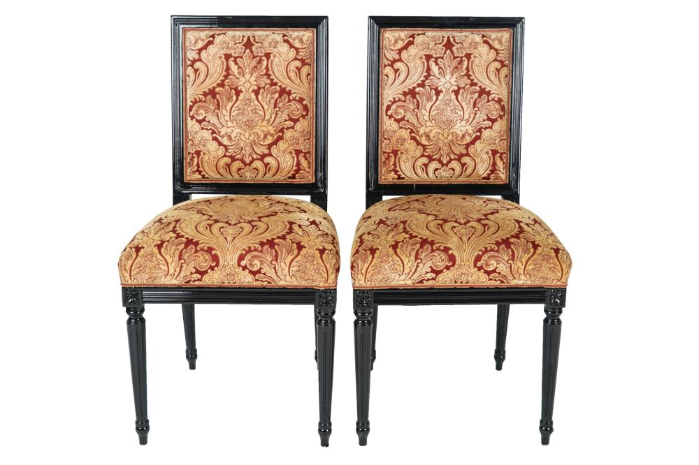 Appraisal: PAIR OF NEOCLASSIC EBONIZED SIDE CHAIRScontemporary each covered in red