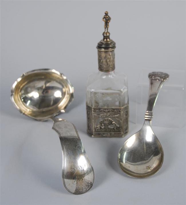 Appraisal: TWO CONTINENTAL SILVER LADLES and a CONTINENTAL SILVER MOUNTED ETCHED