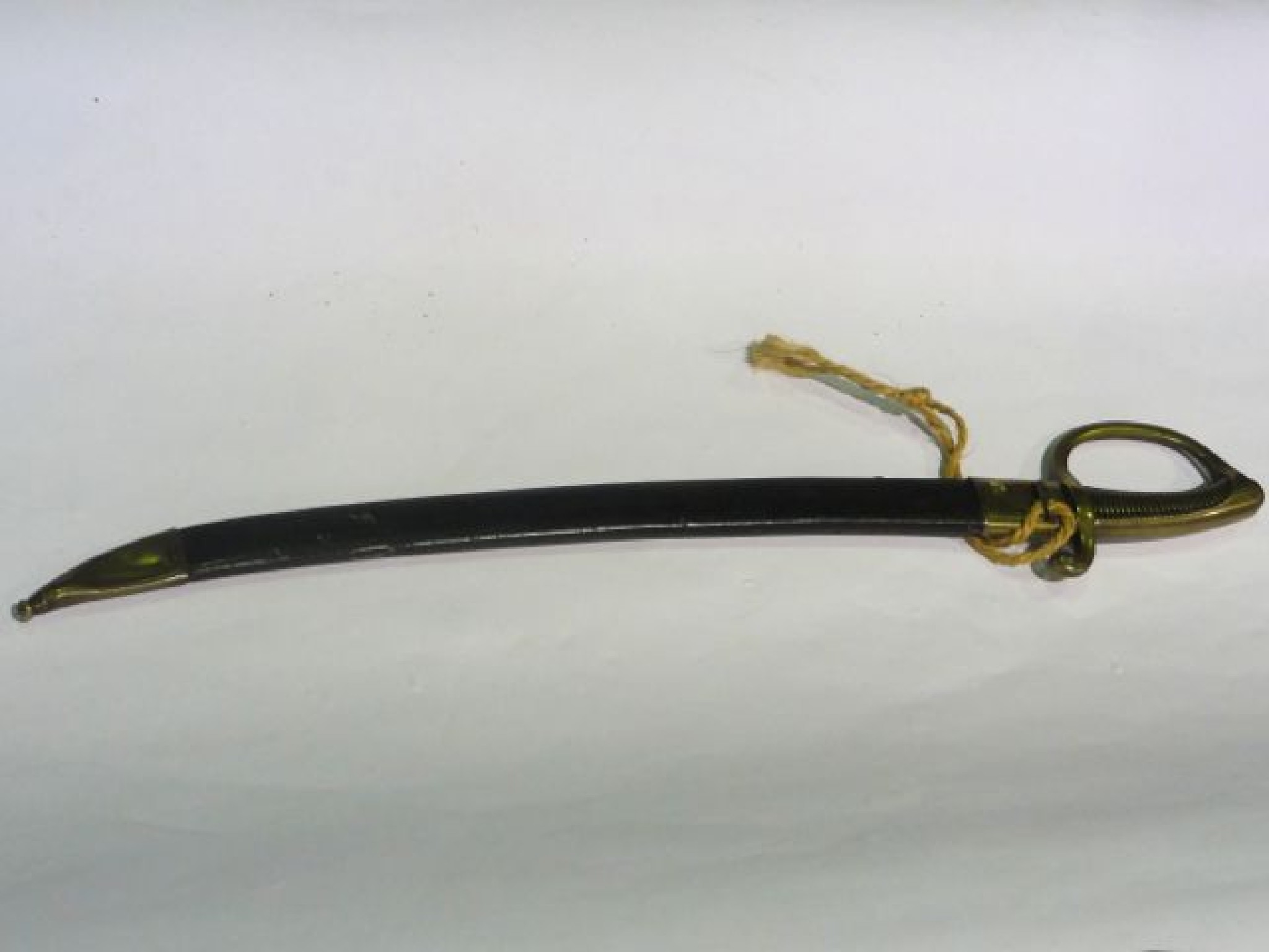 Appraisal: A French model naval cutlass with brass mounts and leather