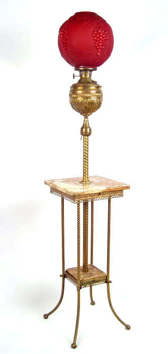 Appraisal: BRADLEY HUBBARD PIANO FLOOR LAMP Brass and marble pedestal side