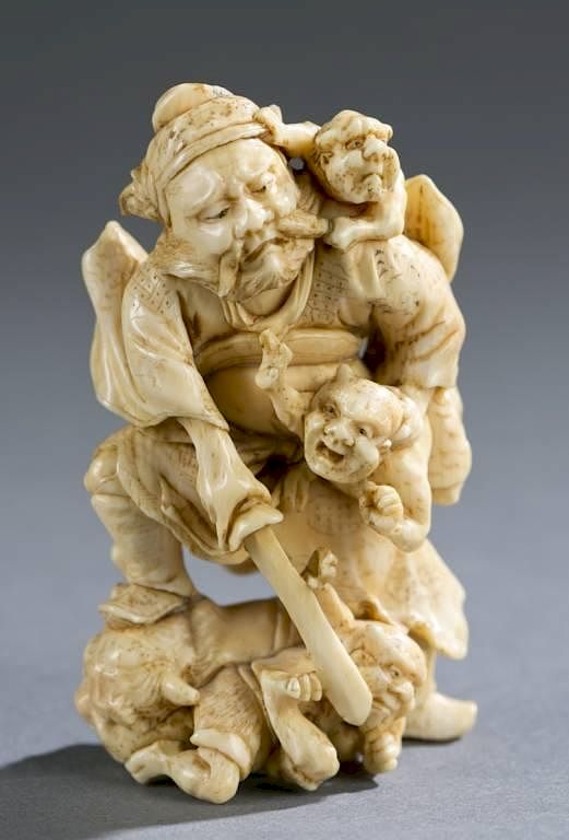 Appraisal: Japanese ivory netsuke of Shoki Oni A Japanese ivory netsuke