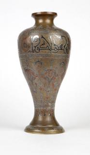 Appraisal: An Indo Persian mixed metal vase th century of baluster