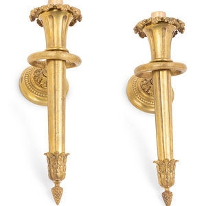 Appraisal: A Pair of Continental Gilt Bronze Single-Light Sconces Circa Height