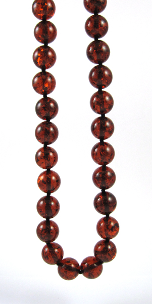 Appraisal: BALTIC PRESSED AMBER BEAD NECKLACE measuring inches in length and