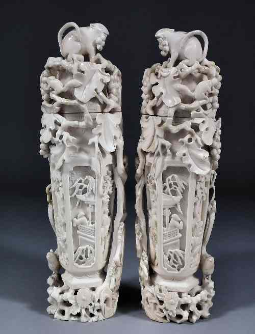 Appraisal: A pair of Chinese ivory hexagonal vases and covers each