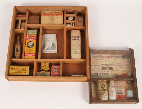 Appraisal: Small wooden box with sliding lid containing rattlers Jim Crow