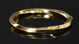 Appraisal: k Tiffany Twist Bangle Bracelet k yellow gold Tiffany Co