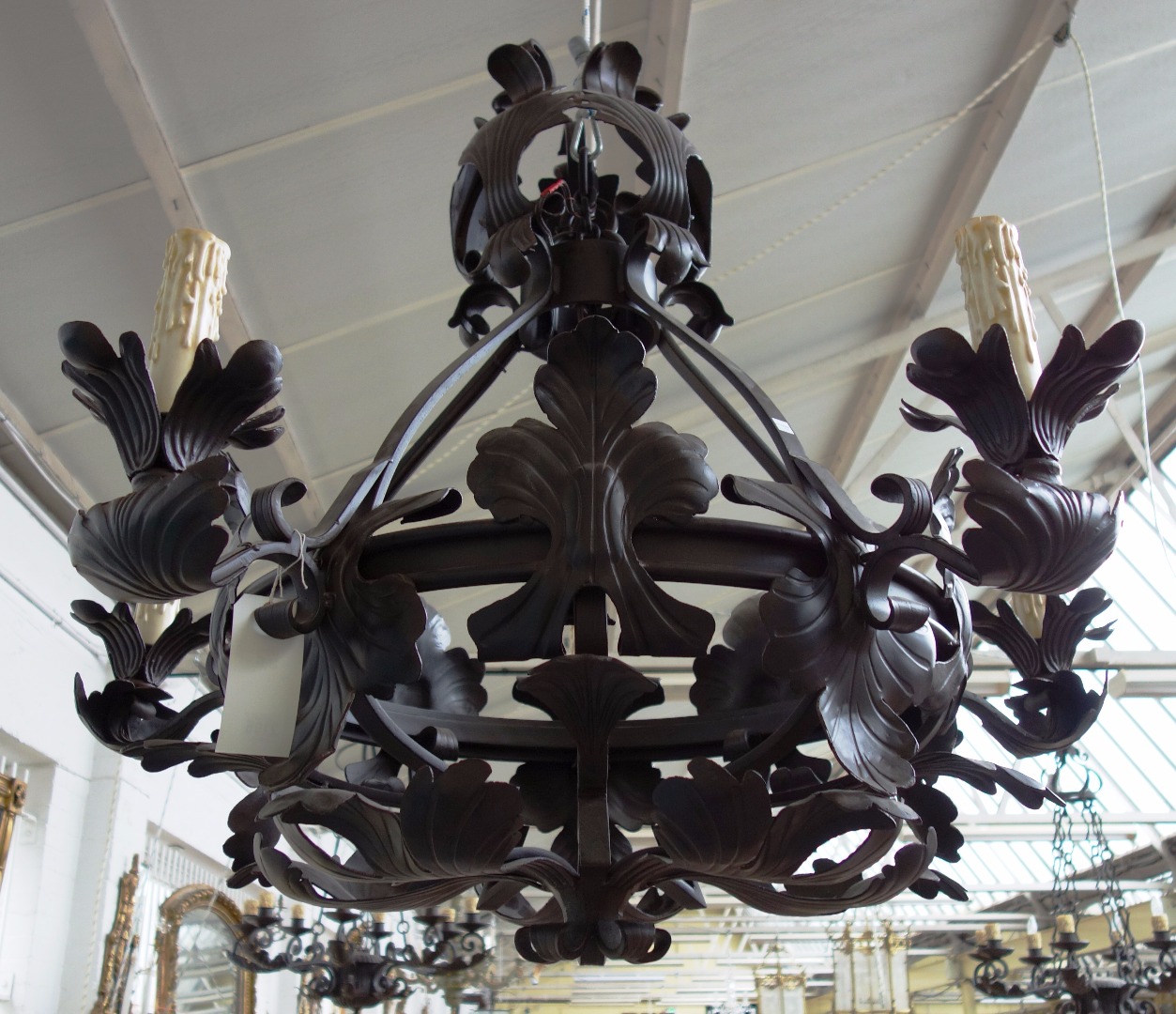 Appraisal: An English wrought iron five light chandelier late th century