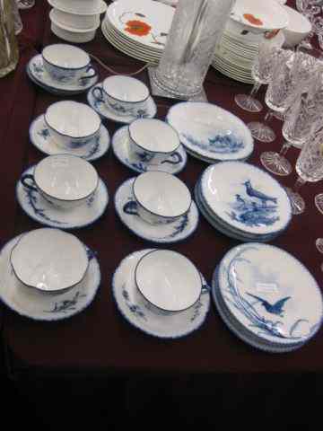 Appraisal: European Porcelain Dessert Service for blue decorated with birds animals