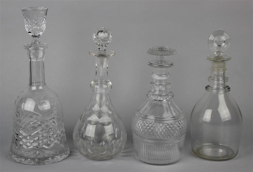 Appraisal: FOUR GLASS DECANTERS AND STOPPERS including one with triple ringed