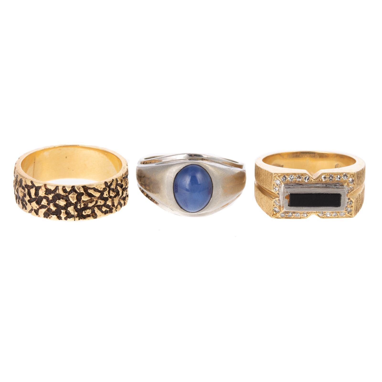 Appraisal: A TRIO OF GEMSTONE RINGS IN K K yellow gold