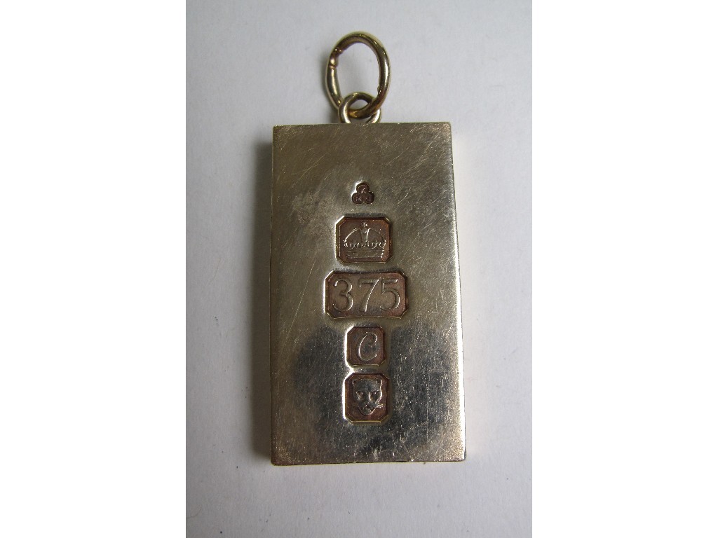 Appraisal: Nine carat gold ingot Approximately gramms