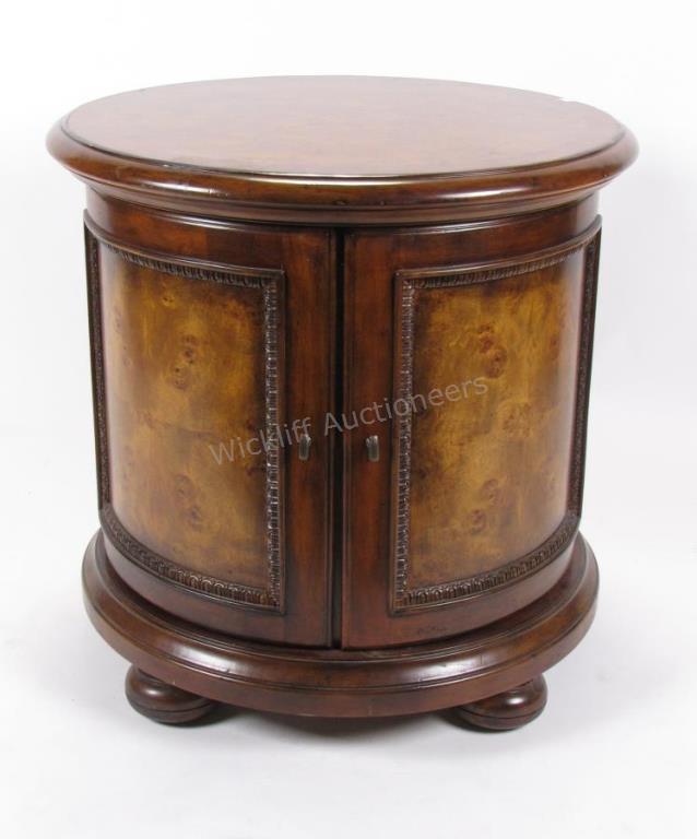 Appraisal: A good quality decorator commode table round with two doors