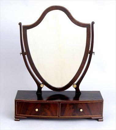 Appraisal: FEDERAL IVORY-MOUNTED AND INLAID MAHOGANY SHIELD-SHAPE DRESSING MIRROR The swing