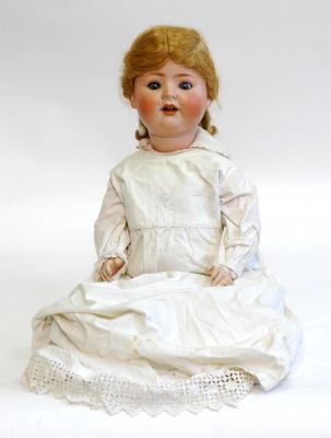 Appraisal: A Schoenau and Hoffmeister bisque head girl character doll with